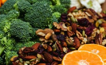 sliced orange fruit and green broccoli